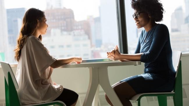 Two women talking